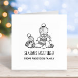 Knitting Snowman Seasons Greetings Self-inking Stamp<br><div class="desc">Cute cartoon illustration of two snowmen dressed in knitted hats and scarves. The big snowman is knitting an oversized scarf for the little one. The scarf is already wrapped several times around the cute little snowman. Customisable text.</div>