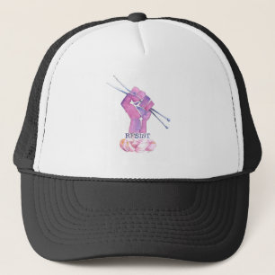Kntting power fist with RESIST Trucker Hat