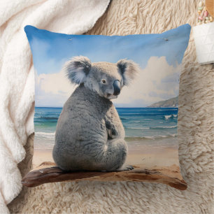 Koala on a sandy beach cushion