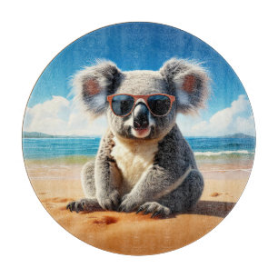 Koala on a sandy beach  cutting board