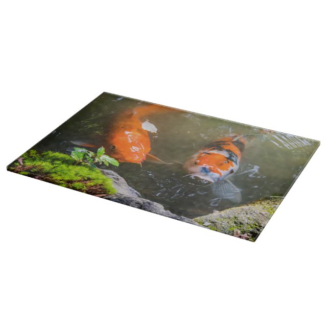 Koi fish in a pond cutting board (Corner)