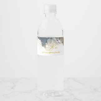 L33 signature alcohol ink art on water bottle label