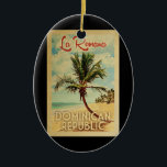 La Romana Palm Tree Vintage Travel Ceramic Tree Decoration<br><div class="desc">A uniquely retro mid-century modern La Romana Dominican Republic art print in vintage travel poster style. It features a curved palm tree on sandy beach with ocean under a blue cloudy sky.</div>