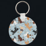 Labradoodle / Goldendoodle Bones and Paws Key Ring<br><div class="desc">Cute Labradoodle / Goldendoodle dogs sit and stand and rollover with cream,  apricot,  chocolate,  black and parti coats with scattered dog bones and pawprints pattern.</div>