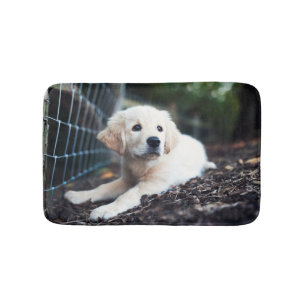 Labrador Puppy Playing In The Garden Bath Mat
