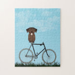 Labrador Retriever Dog Sitting on Vintage Bicycle Jigsaw Puzzle<br><div class="desc">Puzzle featuring an adorable Chocolate Labrador sitting on an old-fashioned bicycle on a blue summer day.</div>