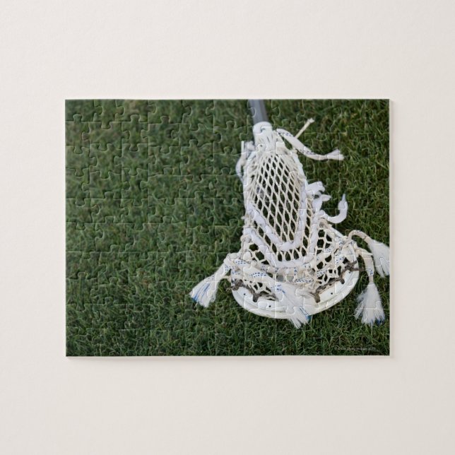 Lacrosse stick on grass jigsaw puzzle (Horizontal)