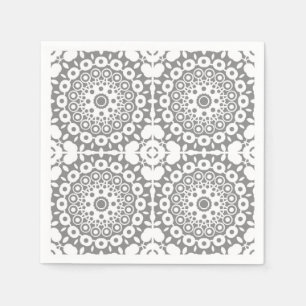 Lacy white squares on a light grey background napkin