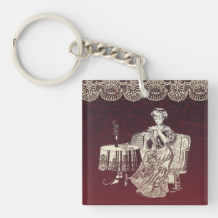 lady drinks tea key ring