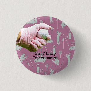 Lady golfer is holding golf ball on pinkbackground 3 cm round badge