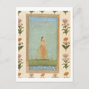 Lady holding a flower, standing by a lily pond, fr postcard