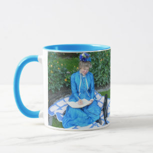 Lady in garden writing book mug