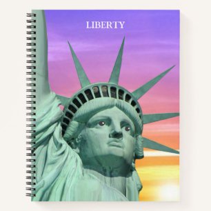 Lady Liberty on Sunrise Sky Notebook