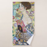 Lady with A Fan, Gustav Klimt Bath Towel<br><div class="desc">Gustav Klimt (July 14, 1862 – February 6, 1918) was an Austrian symbolist painter and one of the most prominent members of the Vienna Secession movement. Klimt is noted for his paintings, murals, sketches, and other objets d'art. In addition to his figurative works, which include allegories and portraits, he painted...</div>