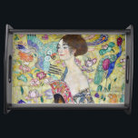 Lady with A Fan, Gustav Klimt Serving Tray<br><div class="desc">Gustav Klimt (July 14, 1862 – February 6, 1918) was an Austrian symbolist painter and one of the most prominent members of the Vienna Secession movement. Klimt is noted for his paintings, murals, sketches, and other objets d'art. In addition to his figurative works, which include allegories and portraits, he painted...</div>