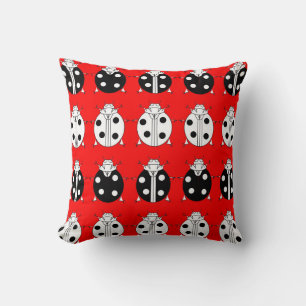 ladybirds pattern cushion