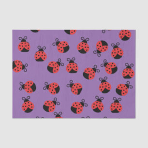 Ladybug ladybird beetles on purple tissue paper