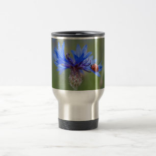 Ladybug on a blue cornflower travel mug