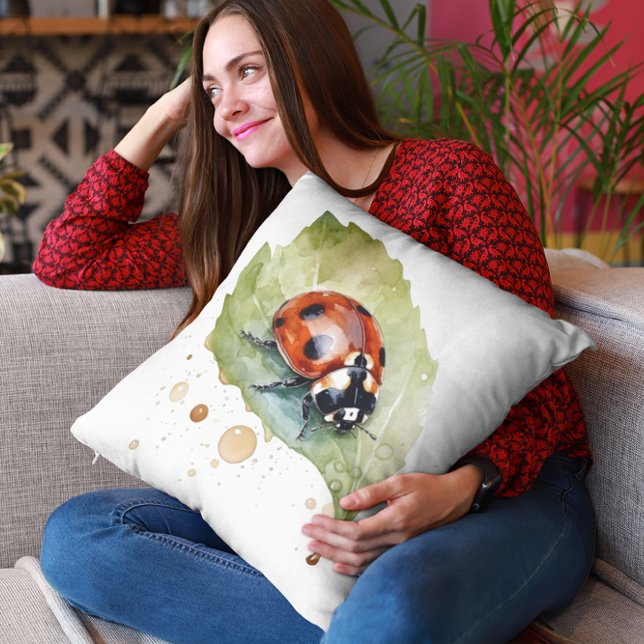 Ladybug sitting on a leaf in vibrant watercolor cushion (Creator Uploaded)