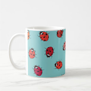 Ladybugs, blue background, charming seamless patte coffee mug