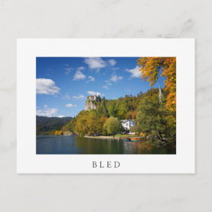 Lake Bled with trees in autumn colours in Slovenia Postcard