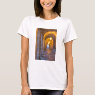 Lamp lit stone hallway, spain T-Shirt