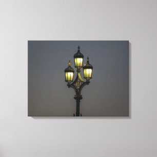 Lamppost lit at night view canvas print