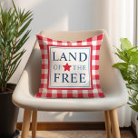 Land of the Free Red Patriotic America Cushion<br><div class="desc">Square patriotic pillow features "Land of the Free" typography design with star accent and red gingham plaid border pattern. Red,  white and navy blue colours.</div>