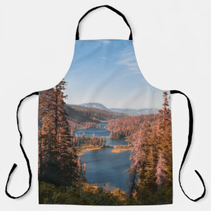 LANDSCAPE PHOTO OF TREES NEAR BODY OF WATER DURING APRON