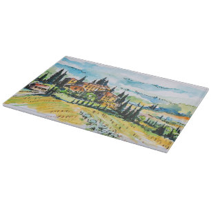 Landscape with town and cypress trees cutting board