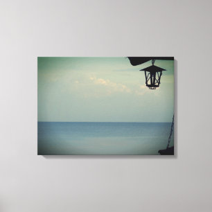 Lantern and the sea Photo Stretched Canvas Print