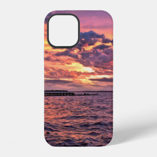 Large colourful sunset over waterbeach,beautiful,c iPhone 12 case