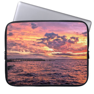 Large colourful sunset over waterbeach,beautiful,c laptop sleeve