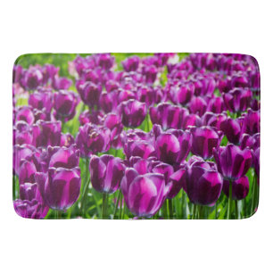 Large field of purple tulips bath mat