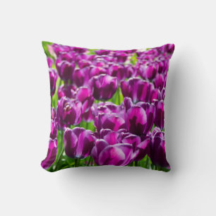 Large field of purple tulips cushion