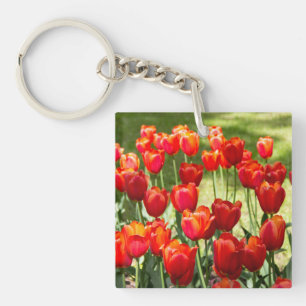 Large field of red tulips key ring