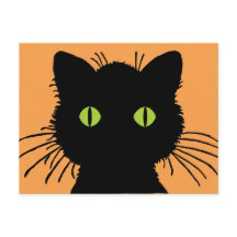 Large Green-Eyed Black Cat with Bulging Eyes