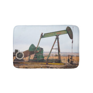Large Green Pumpjack in an Oil Field Bath Mat