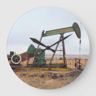 Large Green Pumpjack in an Oil Field Clock