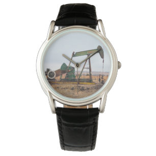 Large Green Pumpjack in an Oil Field Watch