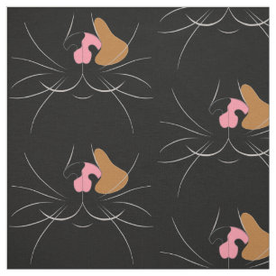 Large Tortoiseshell Cat on Black Fabric