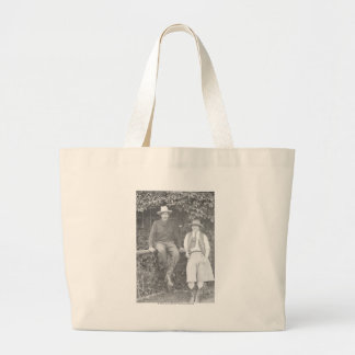 Larry Larom and a women posing. Large Tote Bag