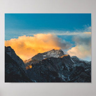 Last light on mountains before sunset poster