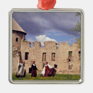 Latvian girls in traditional dress, singing metal tree decoration