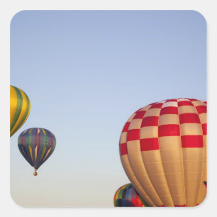 Launching hot air balloons square sticker