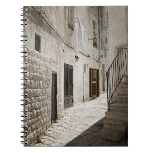 Laundry hanging to dry in an alley in Italy Notebook