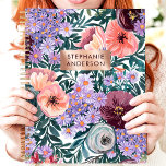 Lavender And Blush Wildflower Custom Name Planner<br><div class="desc">This beautiful design showcases a lush garden of wildflowers in shades of lavender, blush, burgundy, and peach, framed by soft greenery. The rose gold nameplate adds a personalised touch, creating an elegant and timeless look. Perfect for students, professionals, or anyone who appreciates romantic floral designs. Ideal for organising tasks, journalling,...</div>