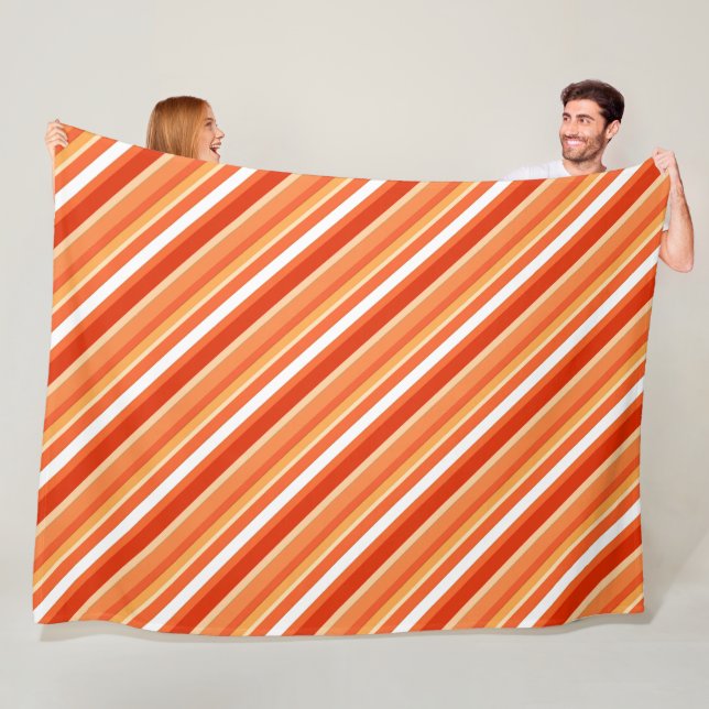 Layered candy stripes - orange and white fleece blanket (In Situ)