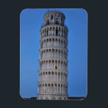 Leaning Tower at Dusk Magnet<br><div class="desc">This captivating photograph showcases the iconic Leaning Tower of Pisa standing elegantly against a deep blue twilight sky in Pisa. The historic marble tower, famous for its unmistakable tilt, is beautifully illuminated, highlighting its intricate Romanesque arches and layered columns. The soft evening light creates a striking contrast between the glowing...</div>