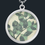 Leaves and Branches on Cream Background Silver Plated Necklace<br><div class="desc">Vibrant green leaves and branches rest on a cream background in this print by Jennifer Goldberger. As the season change the colours on these leaves stay the same,  bringing a little consistency into your life.</div>
